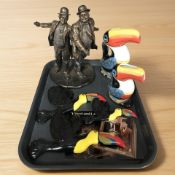 A Shudehill resin figure of Laurel & Hardy, two Guinness toucan jugs manufactured by Enesco,