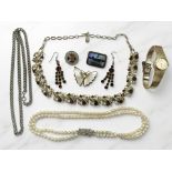 A Seiko lady's wristwatch, a faux pearl necklace, paste-set costume necklace and earrings,
