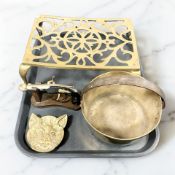 A Georgian pierced brass trivet, a jam pan,