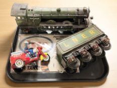 A tin plate model of The Flying Scotsman, an Esso sign,