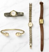 A 9ct gold bangle with steel core, and three lady's gold plated wristwatches signed Rotary,