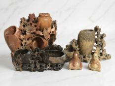 A group of Oriental soapstone carved figures