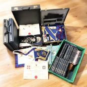A collection of Masonic regalia and ephemera including various briefcases, wooden gavel, medals,