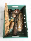 A group of African carvings, wall plaques, figures, etc.
