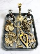 A tray of brass ornaments, candlesticks, animal figures.