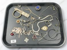A group of costume jewellery, chains, white metal and silver items including pendant on chain,