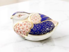 A Royal Crown Derby Quail paperweight, silver stopper.