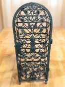 A modern wrought metal bottle rack, width 50 cm.