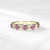 A 9ct gold ruby and diamond half eternity ring, size M, and two costume necklaces.