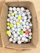 Approximately three hundred and twenty golf balls.