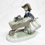 A Lladro figure 'A Barrow of Fun' No. 5460, height 20 cm.