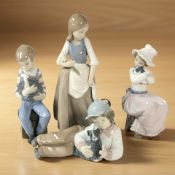 Four Nao figures of children, tallest 22 cm.