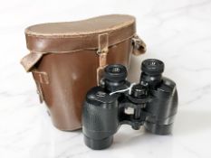 A pair of Ross of London Solaross 9x35 binoculars, with leather case.