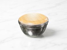 A silver and wood circular paperweight, Carr's of Sheffield, 2000, diameter 6.5 cm.