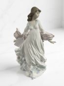 A Lladro figure 'Spring Splendor' No. 5898, height 30 cm, with original box.