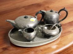 A silver plated tea service on galleried tray.