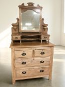 An Edwardian satin walnut mirror backed dressing chest, 94 cm x 54 cm x 168 cm.