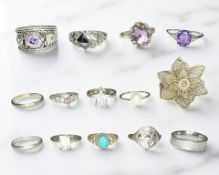 Fourteen various dress rings including gem-set examples,