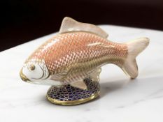 A Royal Crown Derby Koi Carp paperweight, gold stopper.