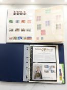 Two albums of stamps.