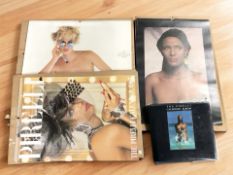 A group of vintage Pirelli calendars.