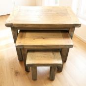 A modern oak nest of three tables, width 66 cm.