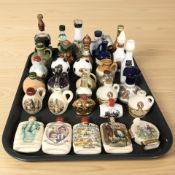 A collection of alcohol miniatures, some retaining their contents.