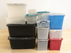 A quantity of plastic storage boxes with lids, the largest 95 cm long.