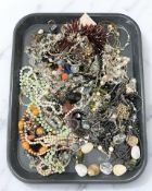 A tray containing a large quantity of costume jewellery.