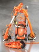 A Flymo electric lawnmower, two strimmers and a hedge trimmer.