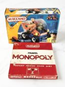 A vintage travel Monopoly set and a plastic nursery Meccano set.