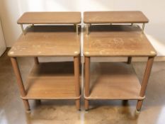 A pair of teak and teak-veneered two tiered bedside stands, width 38 cm.