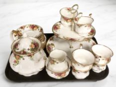 Twenty two pieces of Royal Albert tea china including teapot and two tier cake stand.