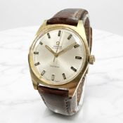 A gent's vintage gold-plated and stainless steel automatic centre seconds wristwatch, signed Omega,