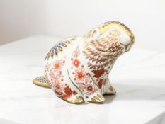 A Royal Crown Derby Beaver paperweight, gold stopper.