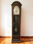 A reproduction Tempus Fugit longcase clock with pendulum and weights, height 195 cm.