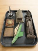 A leather cased travel timepiece, a chrome table lighter surmounted by a plane,