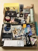 A group of cosmetics, soaps, candle, place mats,
