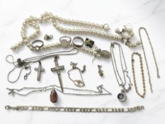 A silver curb link bracelet, dress rings, silver pendants, two gilt-metal bracelets,