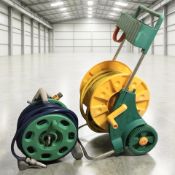 Two garden hosepipe reels.
