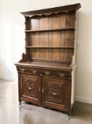An Edwardian stained pine dresser, 123 cm x 47 cm x 203 cm.
