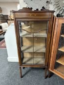 An Edwardian inlaid mahogany display cabinet, width 57 cm.