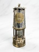 An Eccles Type GR6 steel and brass miner's safety lamp.