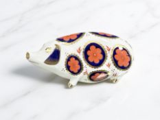 A Royal Crown Derby porcelain Pig paperweight, no stopper.