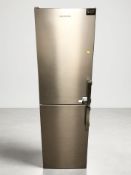 A Grundig stainless steel fridge freezer.