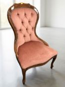 A reproduction lady's chair in the Victorian style.