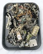 A tray containing a large quantity of costume jewellery.