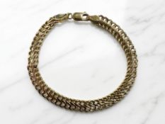 A 9ct gold bracelet, length 18.5cm. CONDITION REPORT: 4.
