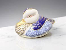 A Royal Crown Derby Duck paperweight, gold stopper.
