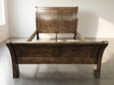 A Barker & Stonehouse stained hardwood 5 ft sleigh bed.